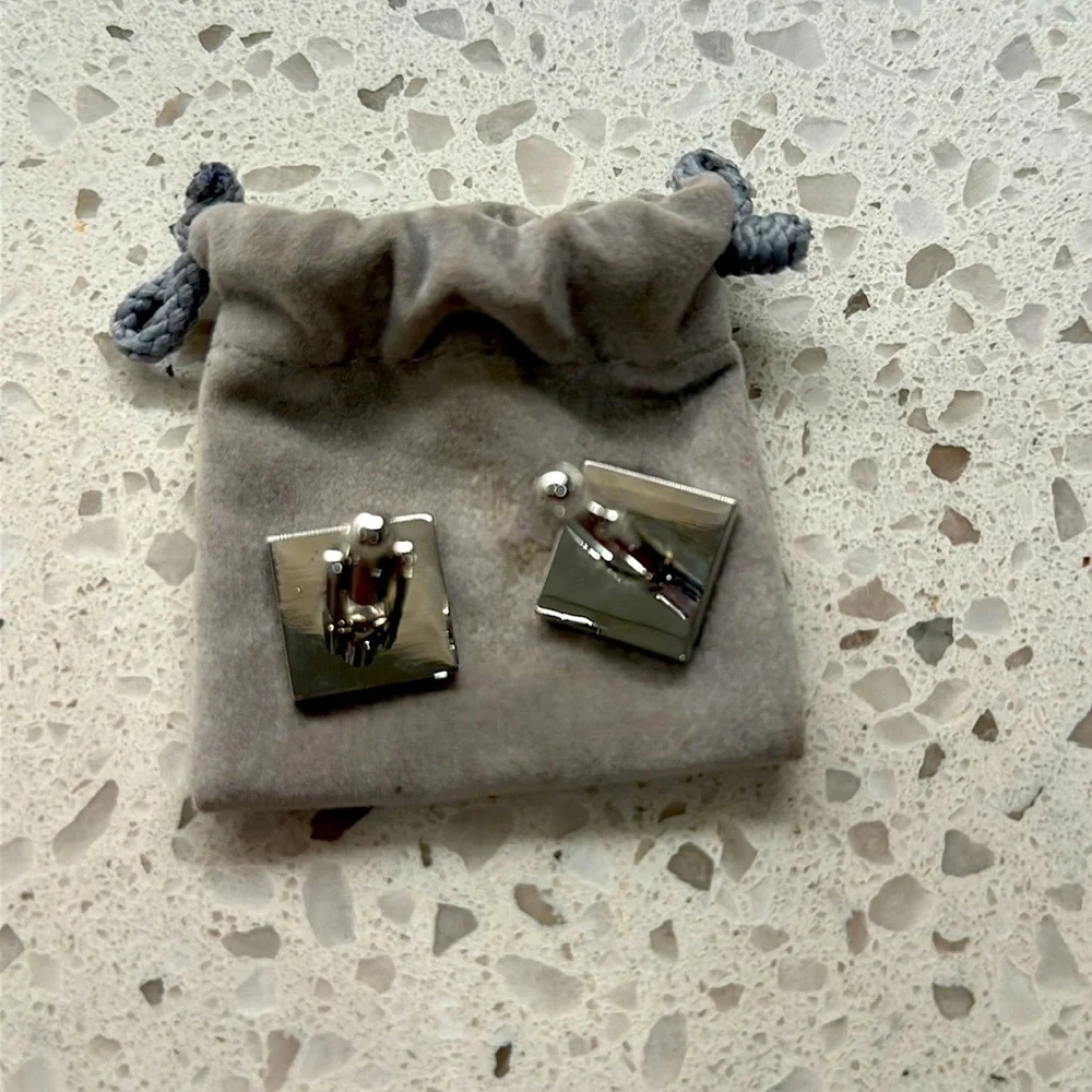 Cufflinks Mother of pearl and stainless with pouch.